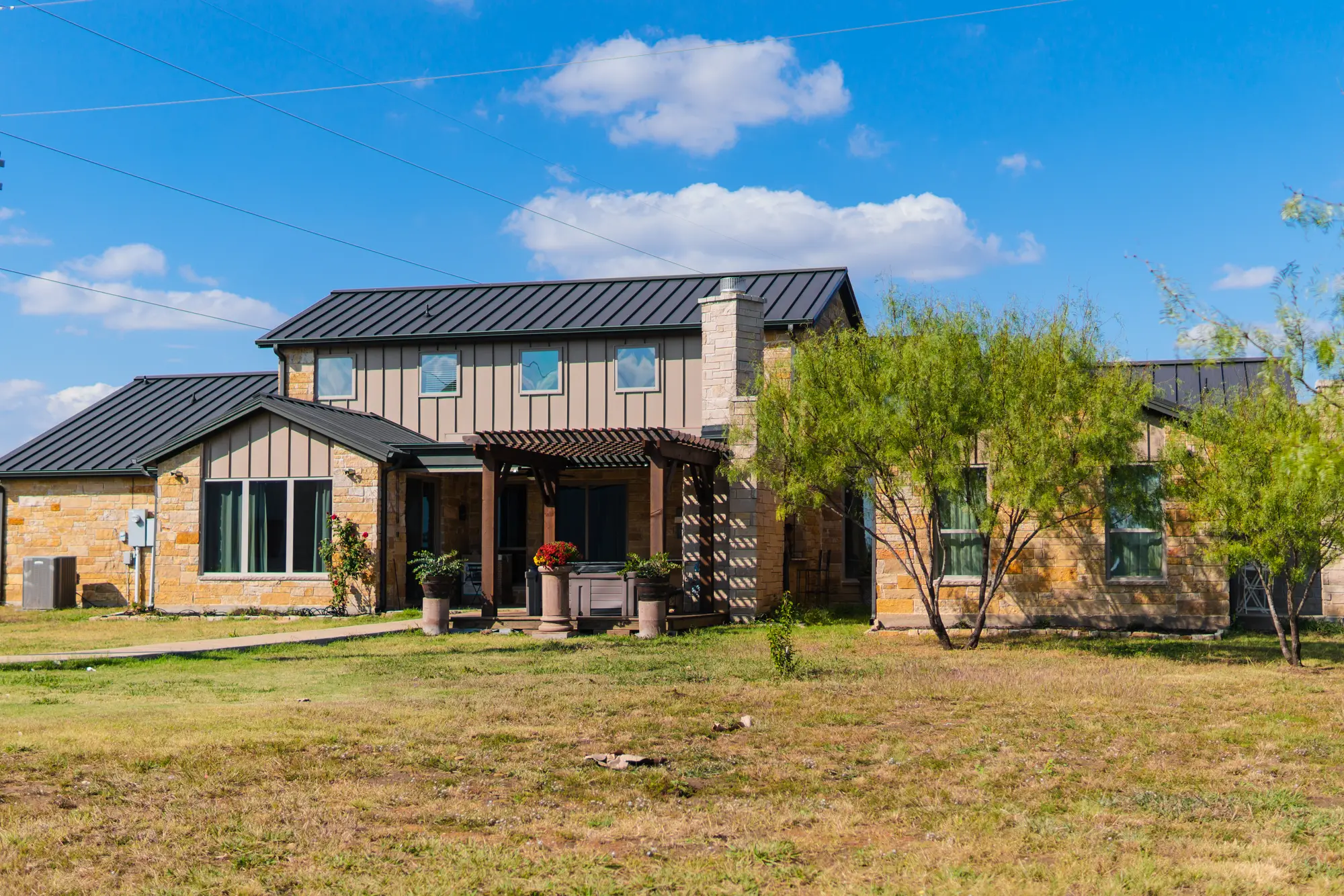 Two-story custom home exterior built by Break Frame Construction